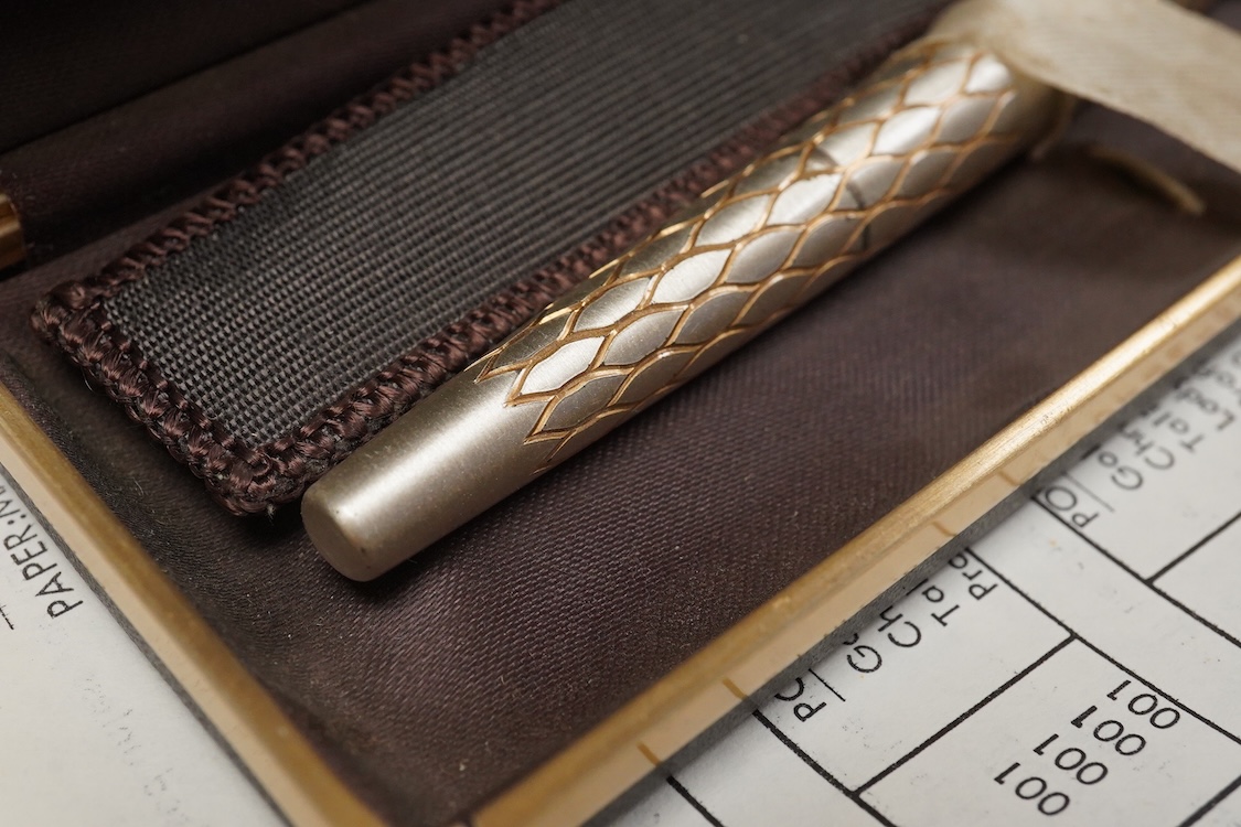 A folder of Parker and Sheaffer pens and ball pens, mostly boxed and a Parker Pen box containing eight items